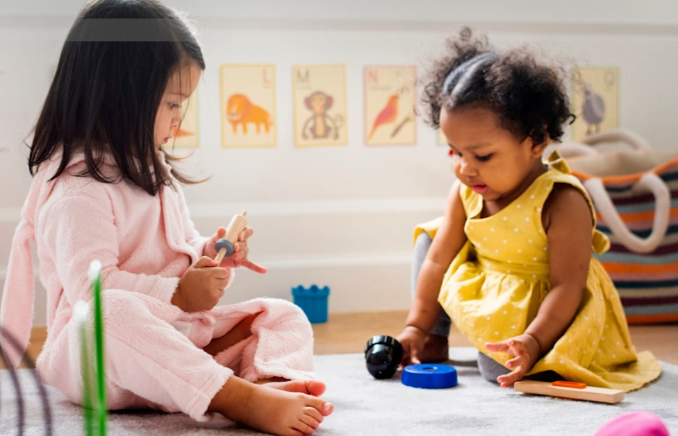 Two young girls with shapes